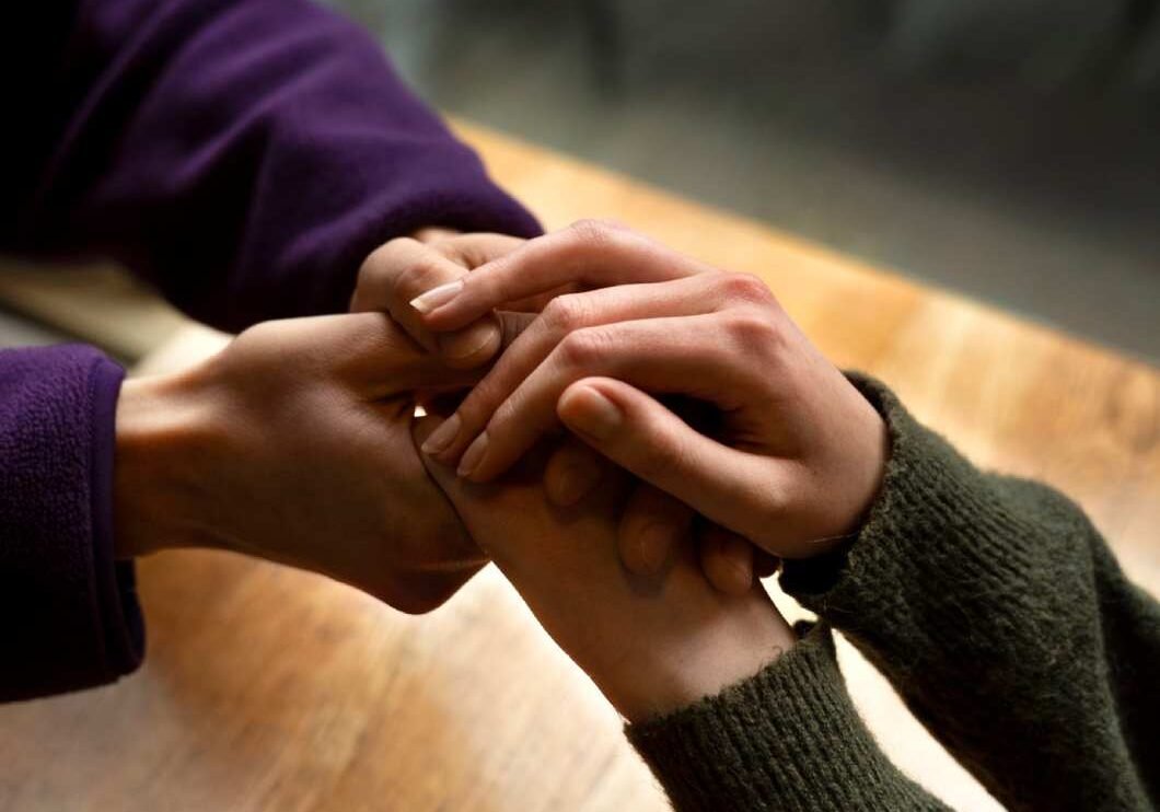 hands-holding-each-other-support